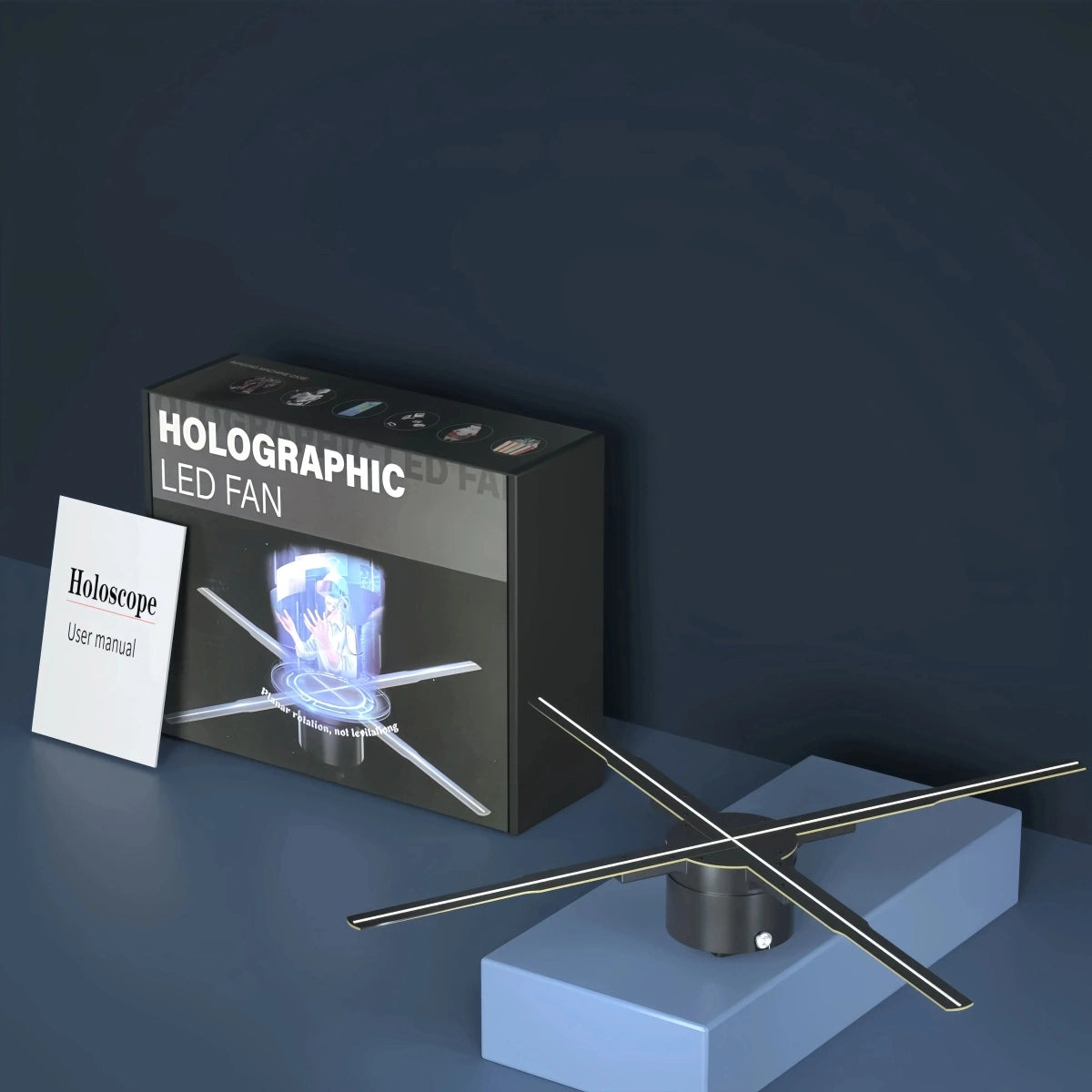 Holographic LED fan with its packaging and user manual displayed on a dark background