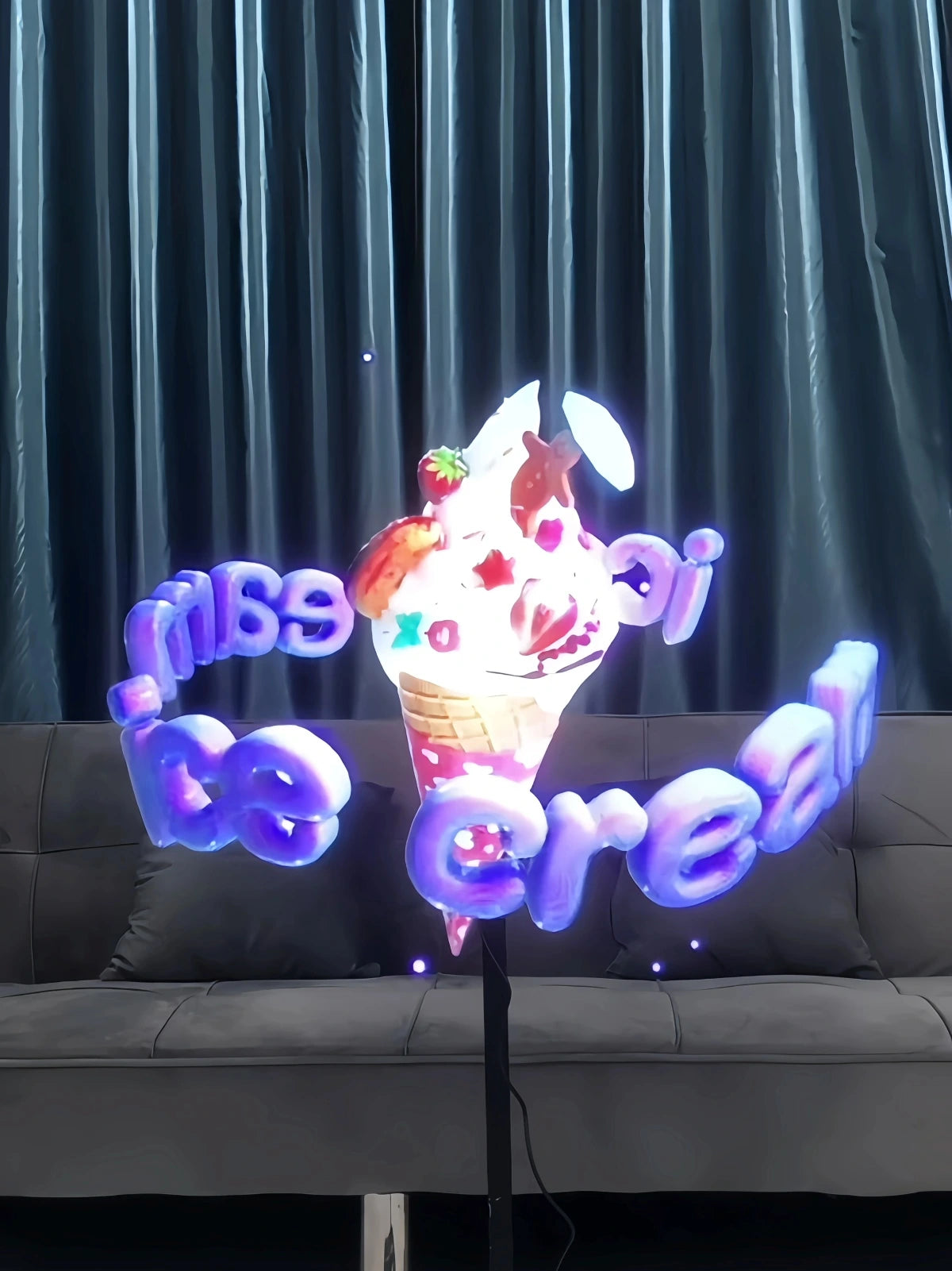 3D holographic display showing a glowing ice cream cone with neon text