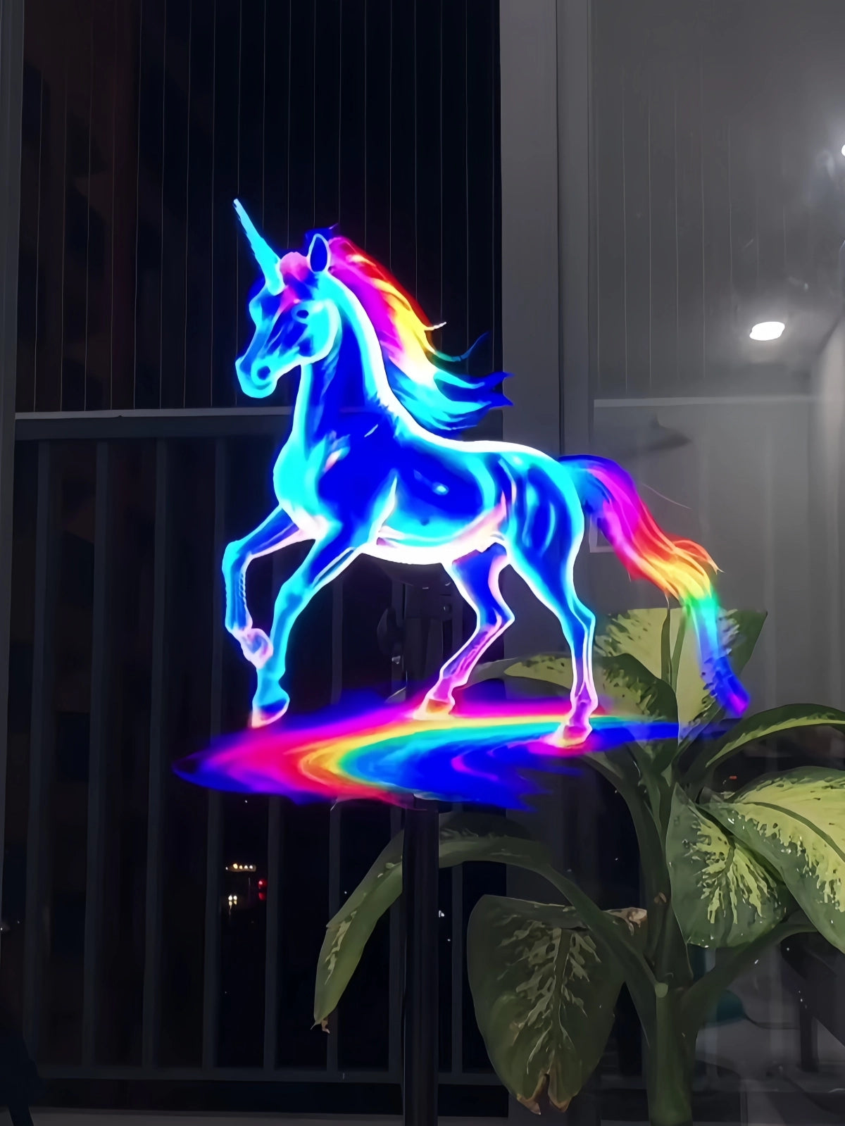 3D holographic unicorn display shown on a HoloX fan with vibrant rainbow lighting.